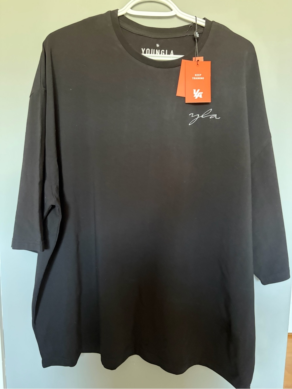 YoungLA Black Short Sleeve Tee with Small Script Logo and Orange Tag